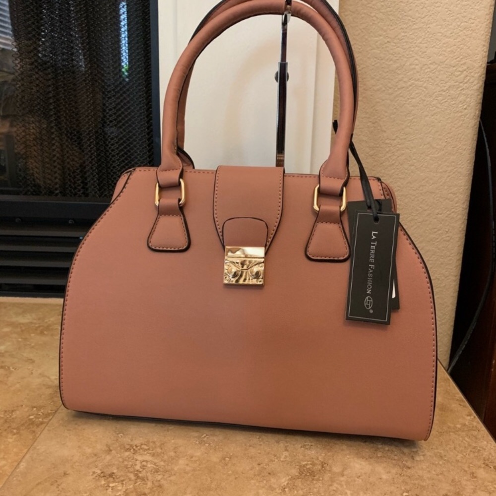 Pink purse with a wide opening